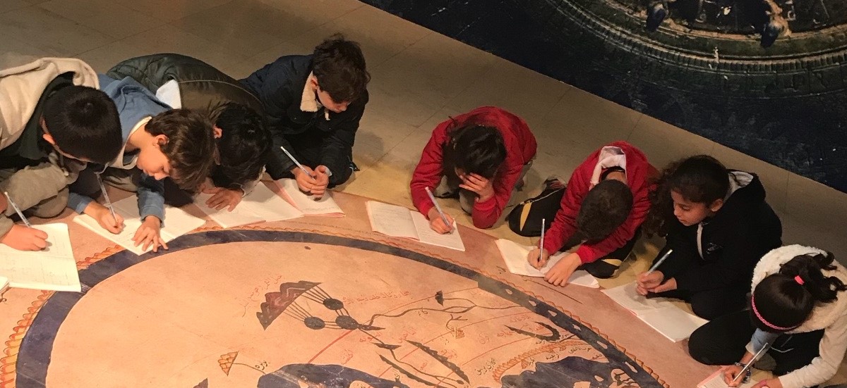 children drawing mosaics